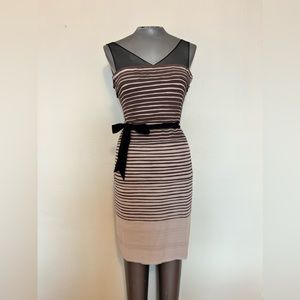 BCBG size 4 knit dress taupe with sheer black sleeves and black belt.